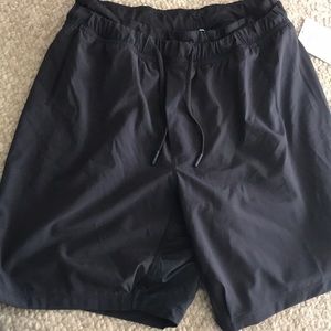 Men’s lululemon shorts (on the mat)